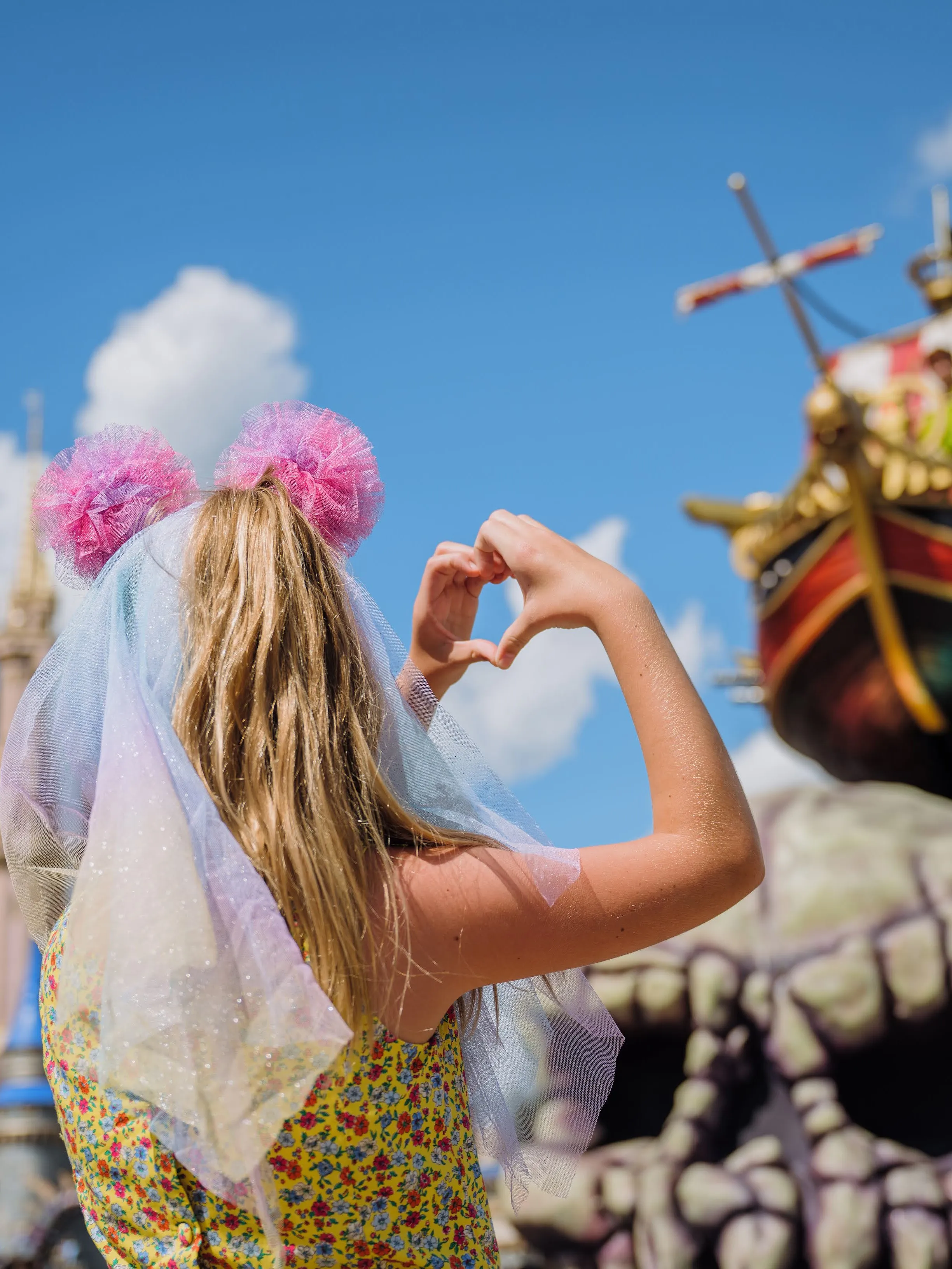 Photo of a Disney Cruise Ship's horns, with a chimney behind